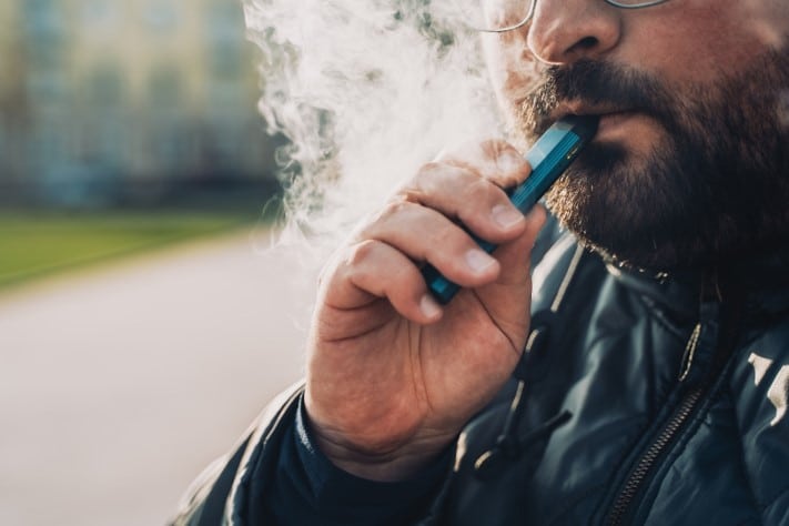 Man smoking a vape